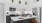 a kitchen with white cabinets