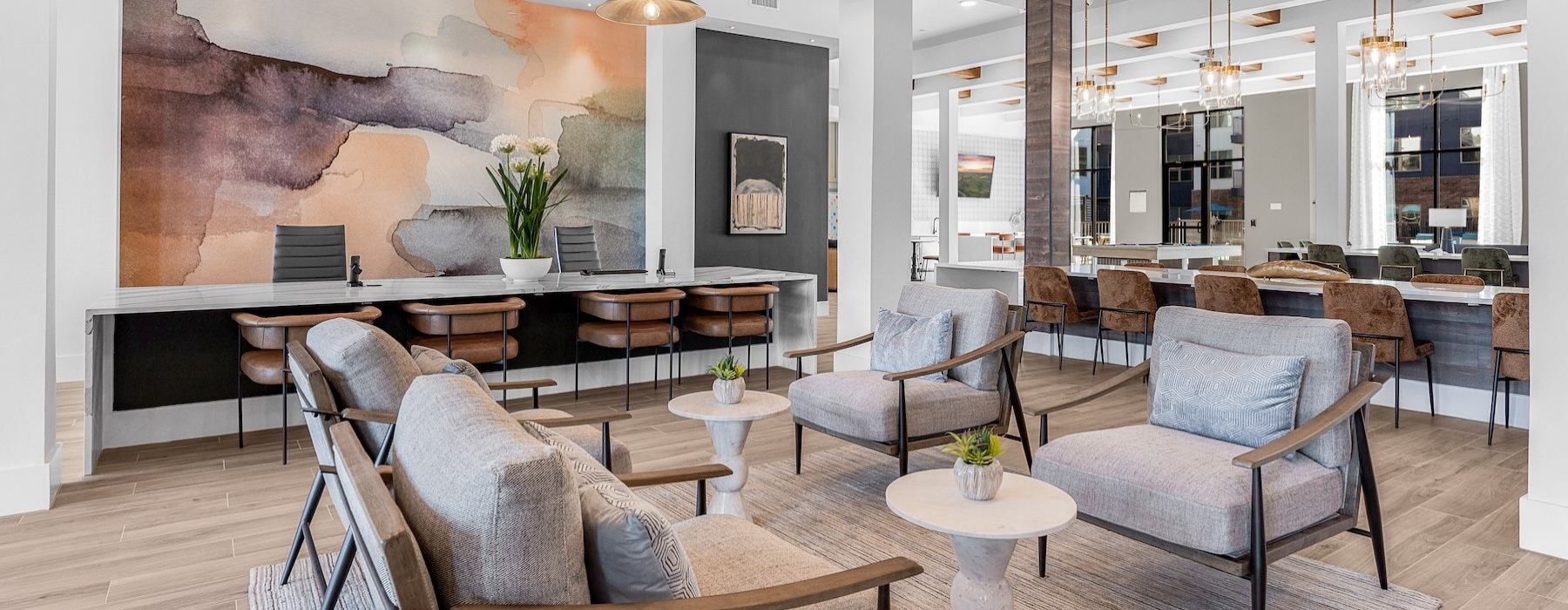a clubhouse room with chairs and tables